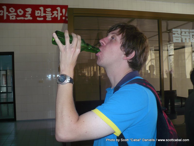 Me tasting freshly bottled mineral water