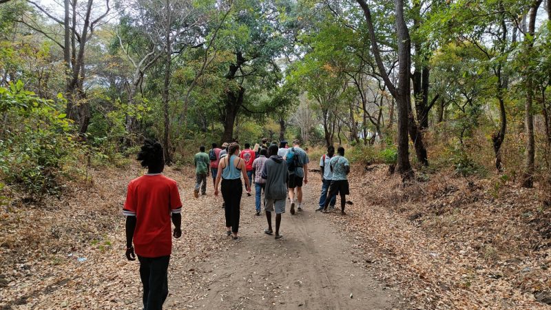 Walking through the community in Kande
