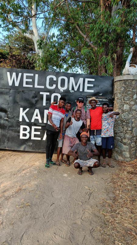 Me with some locals at Kande Beach in Malawi