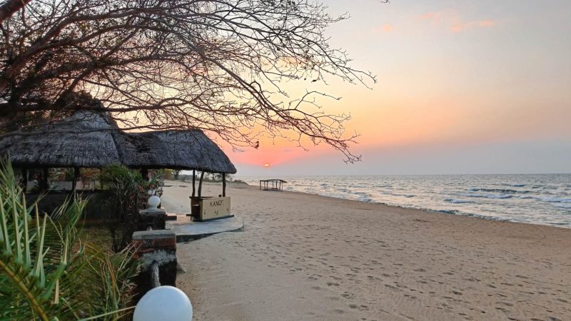 Sunrise over the shore of Lake Malawi, as seen from Kande Beach